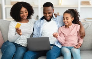 family with a teen using a card