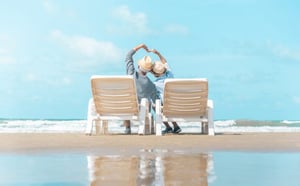 older couple enjoying a beach vacation