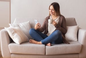 winter-at-home-cozy-on-phone